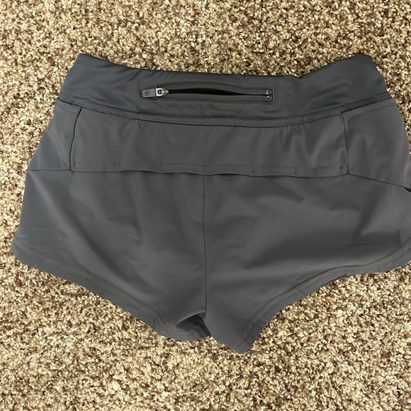 2 pairs (grey and black) size medium (8-10) athleta girl shorts. - Picture 3 of 11